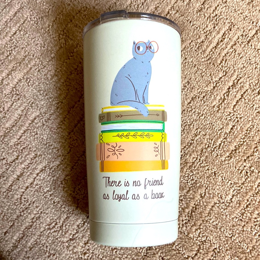 “There is not friend as loyal as a book” tumbler.